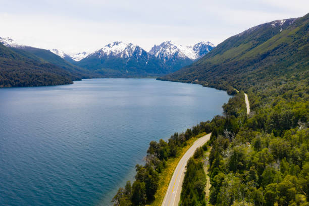 istock Bariloche road by lake, mountain range with snow, Argentina 1418187862