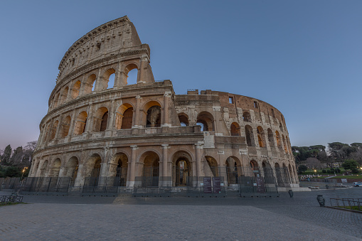 The Colosseum in Rome without people at Sunset in wide angle shot