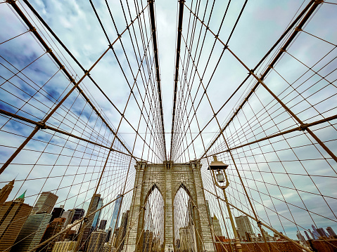 Low angle view of Brooklyn bridge. Manhattan in the background. New York, USA