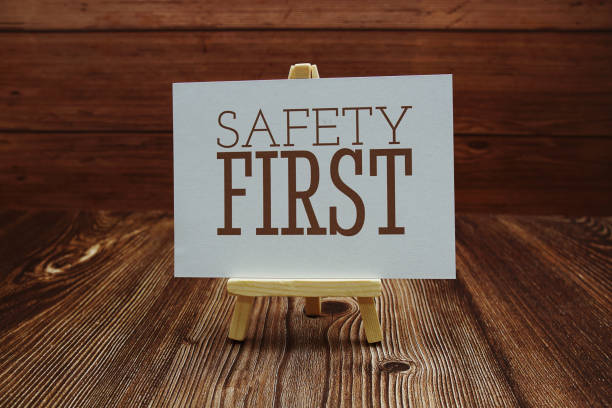 istock Safety First text on paper card on wooden background 1418190935