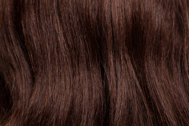 istock Dark brown chocolate color hair background 1418196352