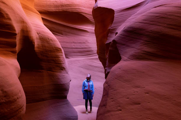 istock Woman between rocks in Antelope Canyon 1418196430