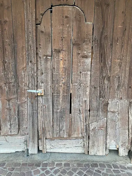 Front view of an old wooden door.