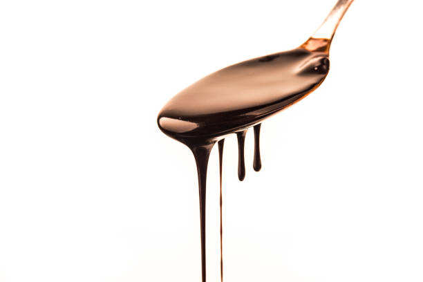 istock Delicious smooth chocolate sauce, flowing chocolate sauce 1418202835