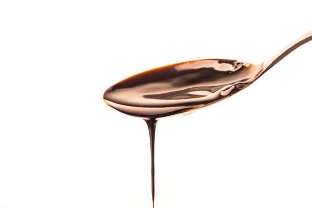istock Delicious smooth chocolate sauce, flowing chocolate sauce 1418202836
