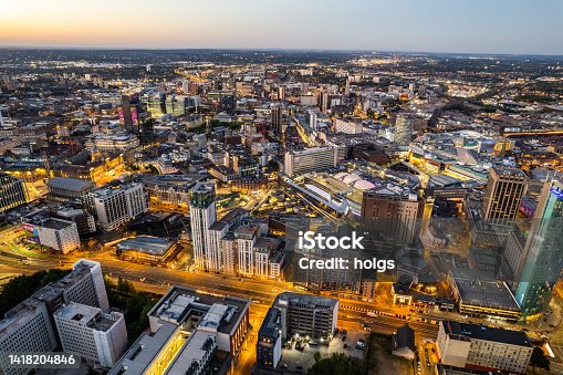 istock Birmingham United Kingdom Aerial view over the city center by night including central train station 1418204846