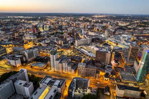 Photo of Birmingham United Kingdom Aerial view over the city center by night including central train station