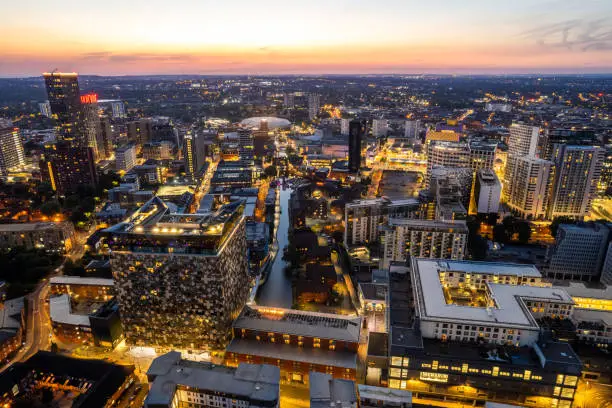 Photo of Birmingham United Kingdom Aerial view over the city center by night including central canals
