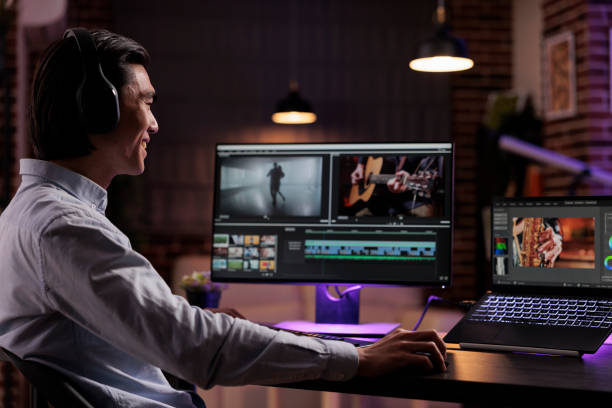 istock Asian creator editing movie footage 1418210660