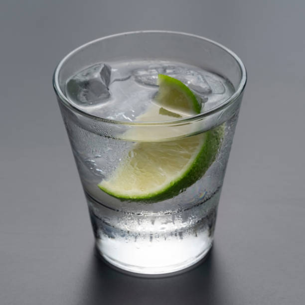 istock Vodka or gin with lime in rocks glass 1418211549