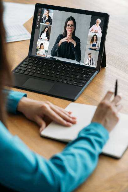 online briefing video meeting female business team stock photo