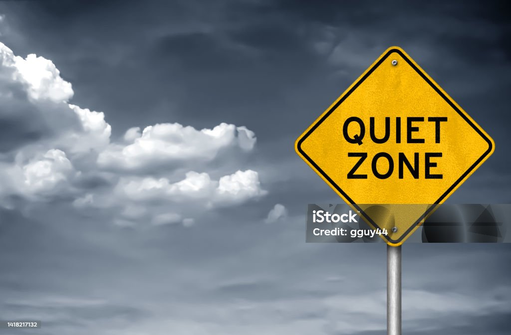 Quiet Zone - road sign warning Silence Stock Photo