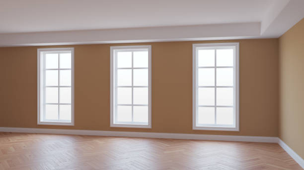 istock Empty Room with Beige Walls, Three Large Windows, Light Glossy Parquet 1418219358