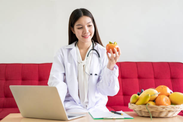 istock Nutritionist talking to patient on a video conference. 1418224171