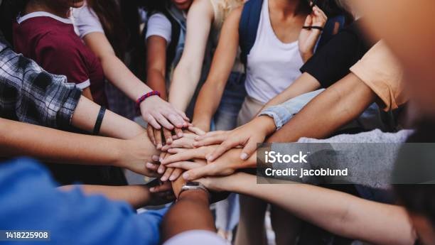 Multicultural Teenagers Expressing Their Unity And Teamwork Stock Photo - Download Image Now