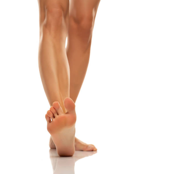 istock Nude barefoot female leg and sole 1418226419