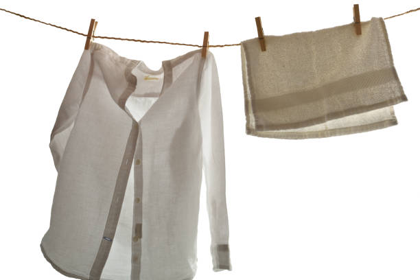 istock White clothes hanging with backlight with white isolated background 1418228368