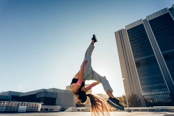 istock Urban woman performing a flashkick 1418228482