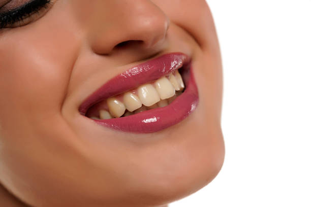istock woman with healthy white teeth 1418235634