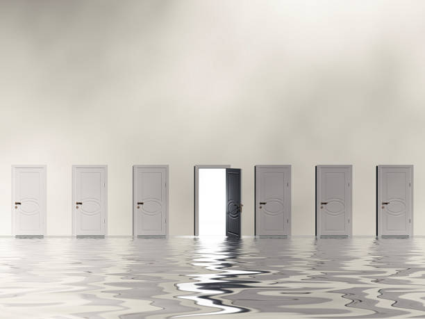 istock Sinigle open doo remits light  in huge white wall in white space 1418239859
