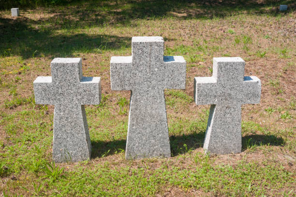 istock Marble crosses in the cemetery at summer 1418244192
