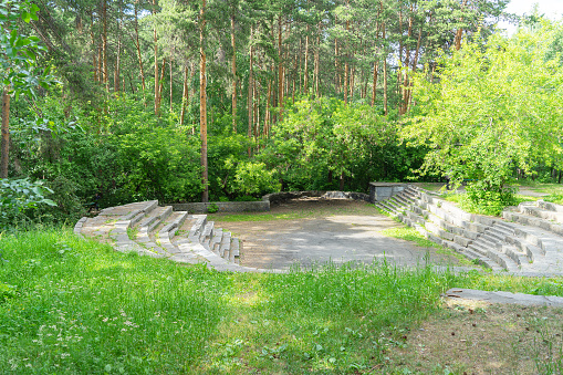 Small stone amphitheater in the city park Stone tents, Yekaterinburg, Russia.