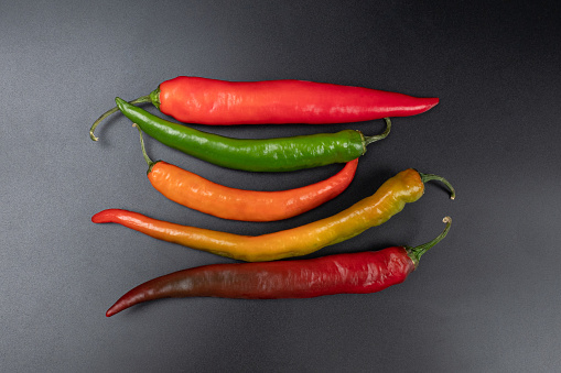 spicy asorti chili peppers green and red color.