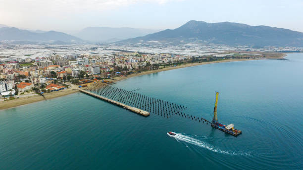 istock pile driving view of pier 1418252711