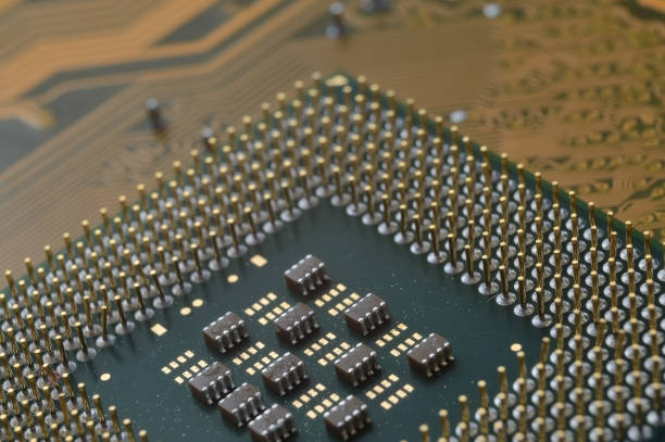 istock microprocessor from the computer lies on the motherboard. close-up. 1418262605