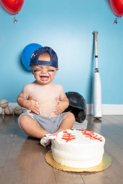 istock Baby Boy Crying at His First Birthday Party 1418262823
