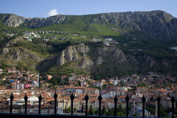 istock Great mountain and town view behind iron railings 1418264727