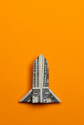 Rocket made from a one dollar bill.