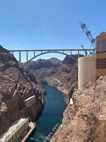 View out from the dam toward the Mike O’Callaghan-Pat Tillman Memorial Bridge. Hoover Dam in the Black Canyon of the Colorado River