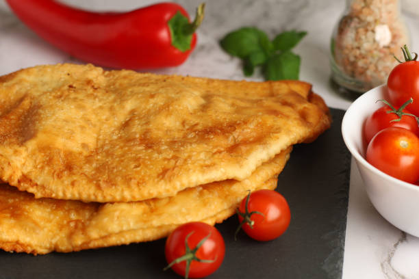 istock chebureks with meat. Tasty and appetizing food 1418273232