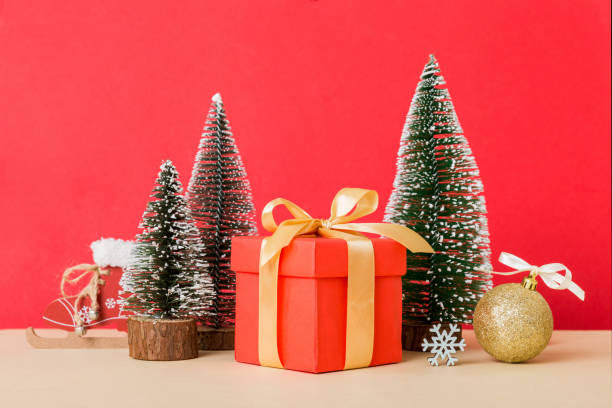 istock Christmas composition. craft Gift box, small tree, branches and craft DIY decorations on white background. New year concept. Christmas home decoration Flat lay, top view, copy space 1418278544