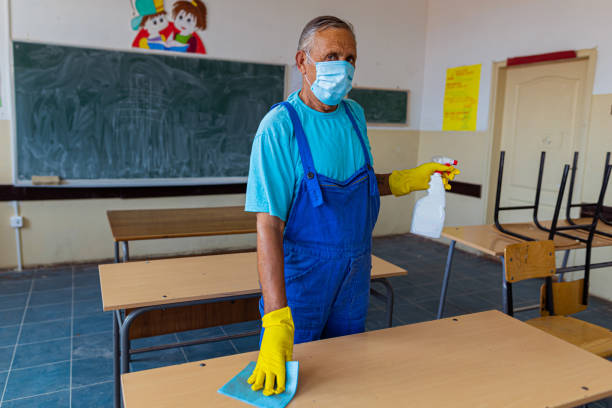 istock Janitors clean the school 1418279412