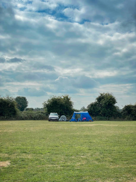 View at a camp site of a car and tents stock photo