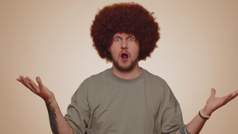 Excited amazed man showing head explosion, looking worried shocked surprised guy, wow idea, eureka