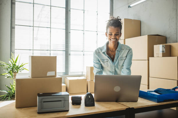 istock Female entrepreneur in e-commerce shop 1418301309