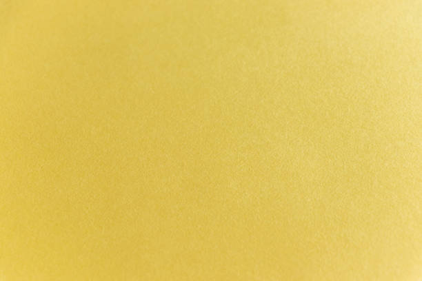 istock Surface texture of light yellow wallpaper 1418302936