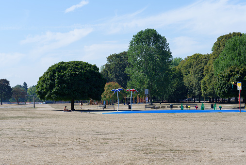 Cologne, Germany, August 24, 2022: dried up water playground in the cologne greenbelt in summer 2022