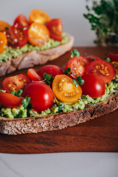 istock Toast with cherry tomatoes and avocado 1418308208