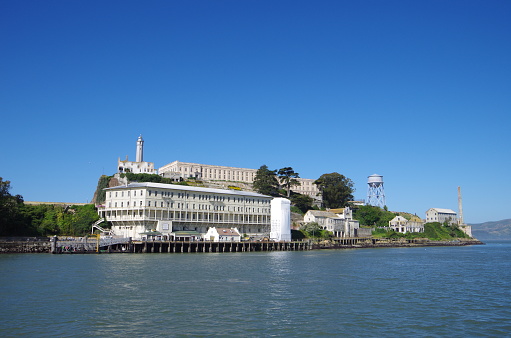 San Francisco, CA,USA - Apri,2, 2013 :Alcatraz Island is a small island, San Francisco Bay of California, floats at the 2.4km from the city of San Francisco.Cruise ship has come out from the ferry landing of the peer 33. Alcatraz is the famous prison island that famous Al Capone was also housed. 
Many tourists visit.It is used as a federal prison until 1963 . it is called The Rock．
