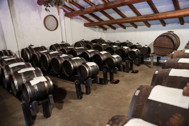 barrels used in the process of making balsamic vinegar - vinegar balsamic vinegar modena italy imagens e fotografias de stock