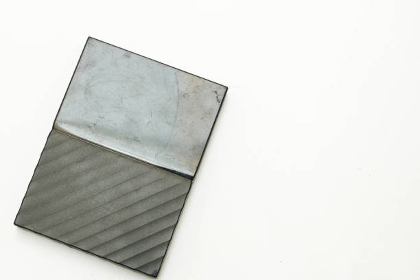 istock black color external hard drive HDD isolated on a white background. copy space 1418324253
