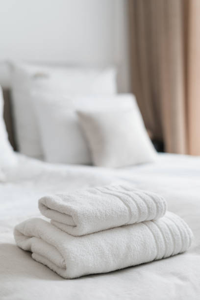 istock White towels in contemporary hotel room design 1418325085