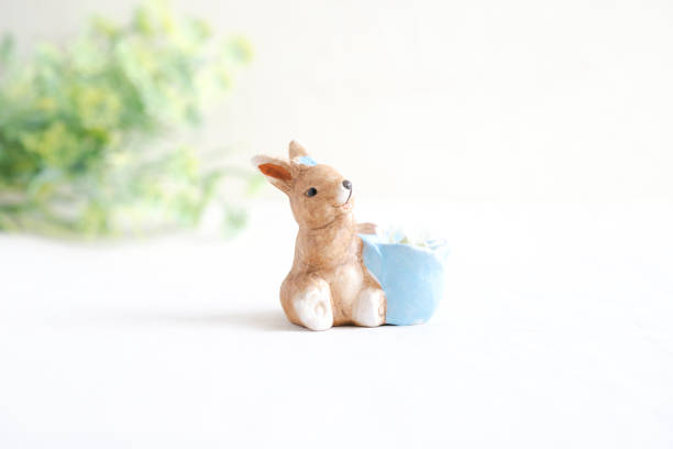 istock Cute rabbit card with natural atmosphere 1418335068