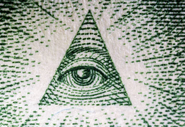 istock Eye on the back of a US one dollar bill. 1418337844