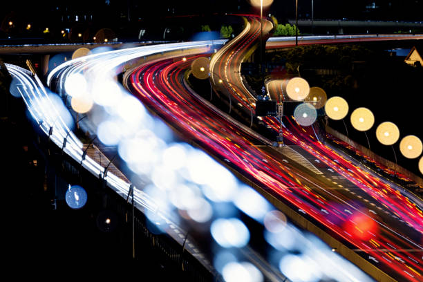 istock Abstract motion-blurred view of speed light at night 1418348820