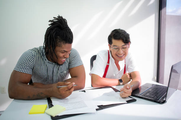 istock coworkers in the office 1418352329